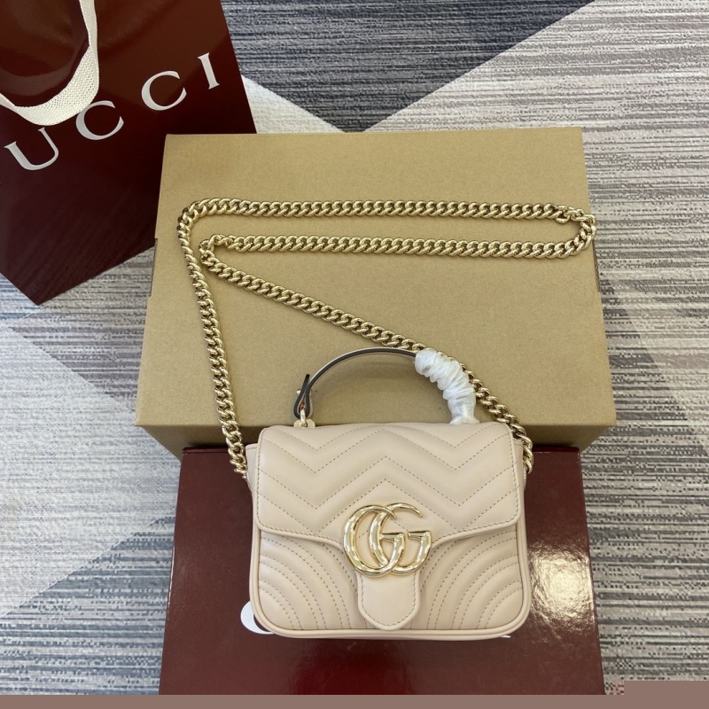 G*u*i top handle bags